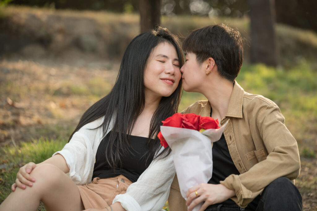 Happy Asian lesbian lgbtq couple dating in love